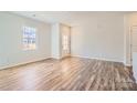 Bright and spacious living room features hardwood floors at 9839 Old Garden Cir, Gastonia, NC 28056