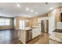 Modern kitchen with stainless steel appliances and granite countertops at 123 Neill Estate Ln, Mooresville, NC 28117