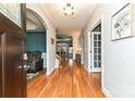 Bright foyer with hardwood floors, opening to staircase and living area, great flow at 1467 Kensington Park Ct, Hickory, NC 28602