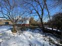 Snowy backyard view of a house at 2244 9Th Ne Ave, Hickory, NC 28601