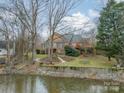 House on waterfront lot with large backyard at 5218 Shadow Pond Ln, Charlotte, NC 28226