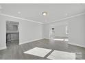 Open concept dining room with gray flooring and kitchen view at 624 Gaywood Dr, Charlotte, NC 28273