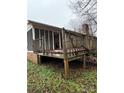 Back deck with sunroom and access to the yard at 7119 Neal Rd, Charlotte, NC 28262