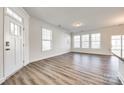 Bright and spacious living room with hardwood floors and lots of natural light at 919 Emma Kate Ct, Lake Wylie, SC 29710