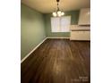 Cozy dining area with hardwood floors and a light-filled atmosphere at 1024 Eaglewood Ave, Charlotte, NC 28212