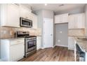 Kitchen with stainless steel appliances and granite countertops at 105 Clarendon St # E, Mooresville, NC 28117