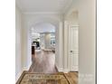 Bright entryway with arched hallway leading to the living area at 1115 Millview Ln, Matthews, NC 28104