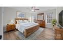 Spacious main bedroom with light wood furniture and wood-look floors at 1417 Wildwood Dr, Kannapolis, NC 28081