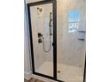 Modern bathroom with a frameless glass shower and marble-look tile at 1933 Hendricks St, Rock Hill, SC 29732