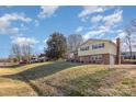 Two-story house with a large yard and mature trees at 2465 Cedar Valley Dr, Conover, NC 28613