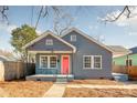 Charming gray house with pink door and small front porch at 2514 Ringwood St, Charlotte, NC 28208