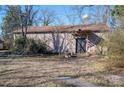 Detached building with metal roof; potential workshop or storage at 327 S Grove St, Lincolnton, NC 28092