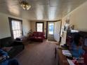 Cozy living room featuring a fireplace and comfortable seating at 416 Richardson St, Albemarle, NC 28001