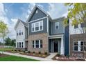 Two story townhome with gray and brick exterior at 1108 Verdigris Dr # 802/0802, Gastonia, NC 28054