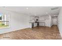 Bright dining area with hardwood floors and access to backyard at 1411 5Th Street Ne Dr, Hickory, NC 28601