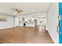 Open-concept living space with hardwood floors seamlessly connected to the updated kitchen at 1160 Nw 11Th Street Cir, Hickory, NC 28601