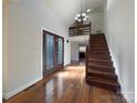 Hardwood floors, double doors, and staircase in entryway at 122 Cricket Creek Dr, Cherryville, NC 28021
