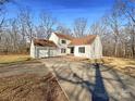 Two-story house with attached two-car garage and deck at 122 Cricket Creek Dr, Cherryville, NC 28021