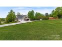 Two-story house on a large lot with a detached building at 176 Butch Branch Rd, Union Grove, NC 28689