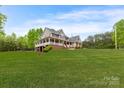Two-story house with a large front yard and attached garage at 176 Butch Branch Rd, Union Grove, NC 28689