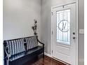 Small entryway with bench and door leading into the home at 3033 Honeylocust Ln, Fort Mill, SC 29707