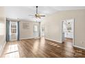 Spacious living area with hardwood floors and access to the kitchen at 4702 Powder Horne Ln, Conover, NC 28613