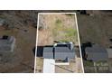 Aerial view showing house, yard, and driveway at 516 Spring Garden Ave, Kannapolis, NC 28081