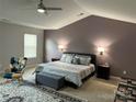 Spacious main bedroom with vaulted ceilings and a king-size bed at 529 Elmwood Pond Ct, Charlotte, NC 28214