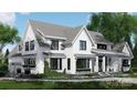Beautiful two-story home featuring a welcoming front porch, lush landscaping, and an elegant design at 6515 Rehobeth Rd # 2, Waxhaw, NC 28173