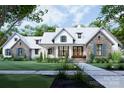 Stunning two-story home featuring a blend of stone and siding, a welcoming porch, and a beautifully landscaped front yard at 6515 Rehobeth Rd # 2, Waxhaw, NC 28173