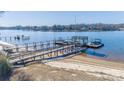 Aerial view of waterfront property with multiple docks at 130 Sandy Shore Dr, Mooresville, NC 28117