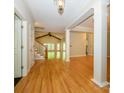 Open foyer with hardwood flooring, leading to the staircase and living spaces at 1448-1 New Prospect Church Rd, Shelby, NC 28150