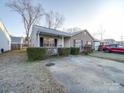 Front yard view of charming house with driveway at 1068 Cherry Meadow Ln, Rock Hill, SC 29732