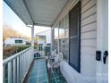 Cozy front porch with two chairs and window shutters at 1068 Cherry Meadow Ln, Rock Hill, SC 29732