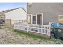 White deck with screen porch and fenced backyard at 1415 Troon Dr, Salisbury, NC 28144