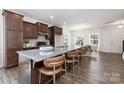 Spacious kitchen island offers counter seating with a view of the adjacent dining room at 24078 Sailfish Dr # 1152, Lancaster, SC 29720