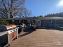 Large deck with patio furniture and grill at 327 Johnson Dairy Rd, Mooresville, NC 28115