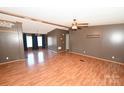 Spacious living room with laminate floors and a ceiling fan at 3463 Rock Creek Dr, Newton, NC 28658