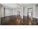 Hardwood floors and an open floor plan view of the kitchen and living room at 4047 Blackburn Ct, Fort Mill, SC 29707