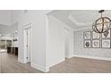 Formal dining room with hardwood floors and modern wall art at 8001 Avanti Dr, Waxhaw, NC 28173