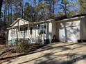 House with attached garage and landscaped yard at 119 Creek View Rd, Mooresville, NC 28117