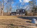 Cute ranch home with a large yard and a stone accent at 188 Mary Cir, Concord, NC 28025