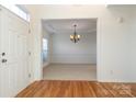 Formal entryway with hardwood floors and views to living and dining areas at 4030 Garden Oak Dr, Indian Trail, NC 28079