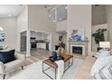 Bright open-concept living room with fireplace, high ceilings, and modern décor at 203 Riverview Ter, Clover, SC 29710