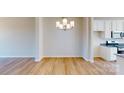 Bright dining room with hardwood floors and chandelier at 8105 Jacey Ln # 39, Huntersville, NC 28078