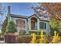 Charming light blue brick home with manicured landscaping and brick walkway at 1204 Buchanan St, Charlotte, NC 28203