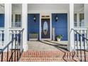 Inviting front porch with stylish decor and a welcoming entrance at 2607 White Pines Ct, Monroe, NC 28112