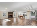 Open living space with hardwood floors, fireplace, and kitchen island at 4224 Walker Rd, Rock Hill, SC 29730