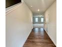 Bright and spacious entryway with hardwood floors at 8112 Derby Woods Ln, Charlotte, NC 28214