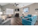 Spacious living room with vaulted ceiling, fireplace, and comfy seating at 8176 Viscount Ct, Denver, NC 28037